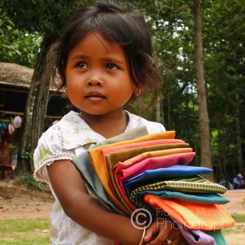 Angkor is swarming with young Cambodian children searching for tourists to buy their souvenirs. Some are incredible entrepreneurs mastering 6 or 7 languages. But all are fun to play with.