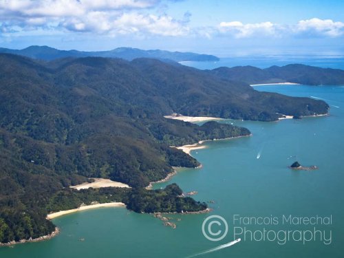 Abel Tasman National Park is the smallest of New Zealand's national parks. The park is bounded to the north by the waters of Golden Bay and Tasman Bay. The park  is renowned for its golden beaches and is a preferred destination for hiking, camping and kayaking.