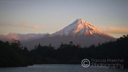 Mount Taranaki, or Mount Egmont, is an active stratovolcano on the west coast of New Zealand's North Island. The 2518-metre-high conical mountain dominates the Egmont National Park.
