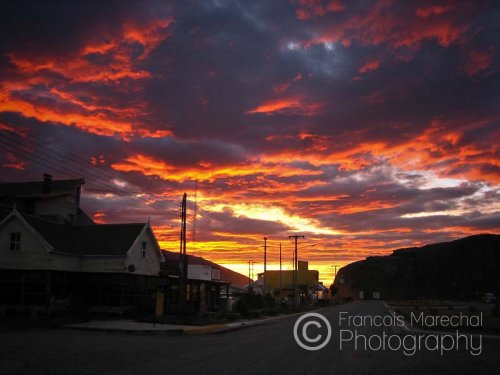 Intense red and orange hues of the cloudy sky caught on camera early in the morning.
