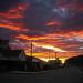 Intense red and orange hues of the cloudy sky caught on camera early in the morning.