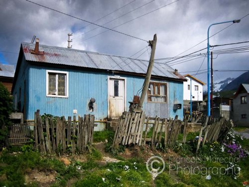 Very basic housing with metallic walls and roof found in the streets of Ushuaia.