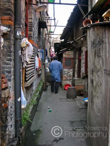 Longtangs are typical backstreets or alleyways in Shanghai, which were built initially to serve urgent housing needs. Many longtang houses have been swept away in the drive for modernization and very few remain as the symbol of old Shanghai.